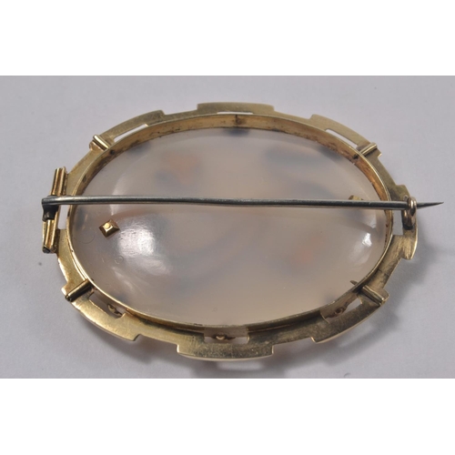 8 - 15ct Oval opaline brooch decorated with floral motif set with torquoise and small old cut diamond.