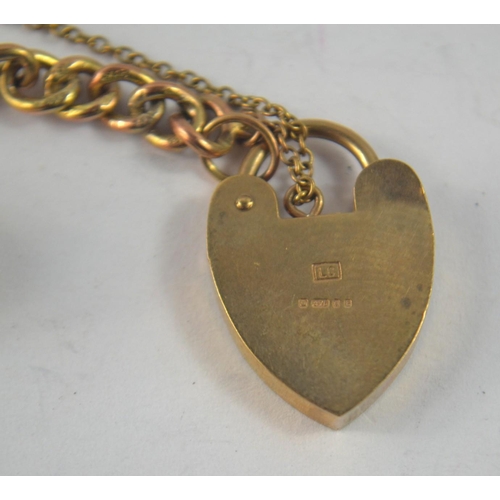 82 - A 375 stamped gold fob watch chain converted to a nice bracelet, comes with a loose piece of amber, ... 