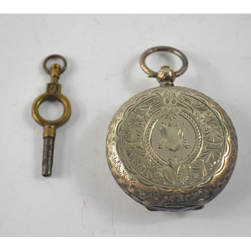 84 - 935 Swiss made pocket with gilt decoration and watch key Diameter 4cm gross weight