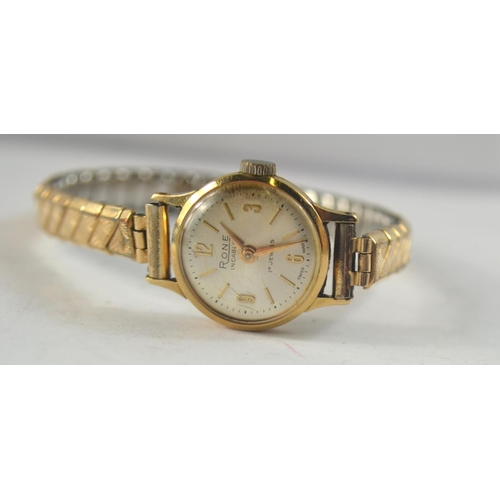 91 - A RONE ladies 375 stamped gold faded wrist watch with expanding yellow metal bracelet gross weight 1... 