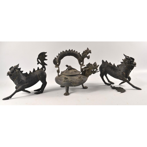 295 - A pair of unusual burnished brass ORIENTAL FOO style Dogs approx 15cm length 20 cm Height, and also ... 