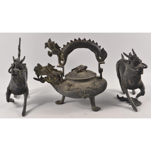 295 - A pair of unusual burnished brass ORIENTAL FOO style Dogs approx 15cm length 20 cm Height, and also ... 