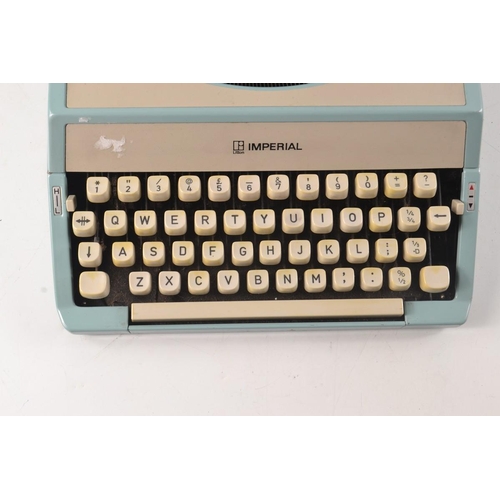 346 - IMPERIAL PORTABLE TYPEWRITER in blue casing