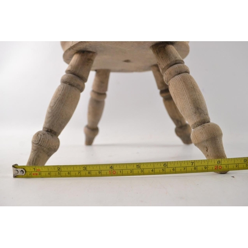 363 - A Victorian tiny triple legged stool in washed light pine look