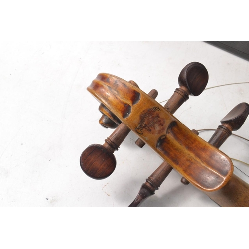 410 - Violin with Stradivarius? label, with bows and case in need of tlc