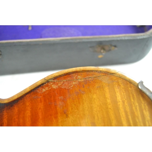 410 - Violin with Stradivarius? label, with bows and case in need of tlc