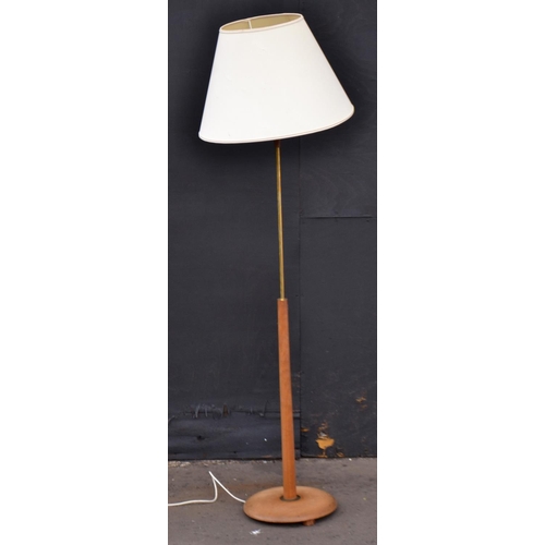 447 - Retro standard lamp finished in team and brass with shade