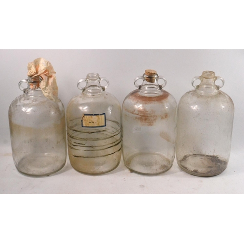 534 - Set of 4 glass Demi-johns