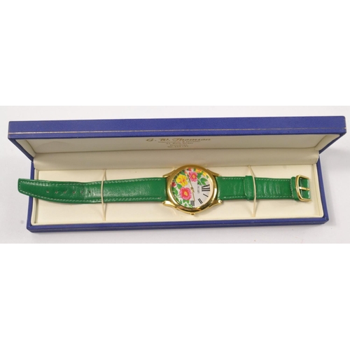 20 - A Designer 'HOTCLUB' ladies wrist watch with floral pink and green flowers with jewellers presentati... 