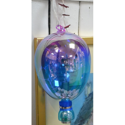 98 - REALLY UNUSUAL - A hand blown blueish/purple coloured glass hanging orb with tiny lights inside powe... 