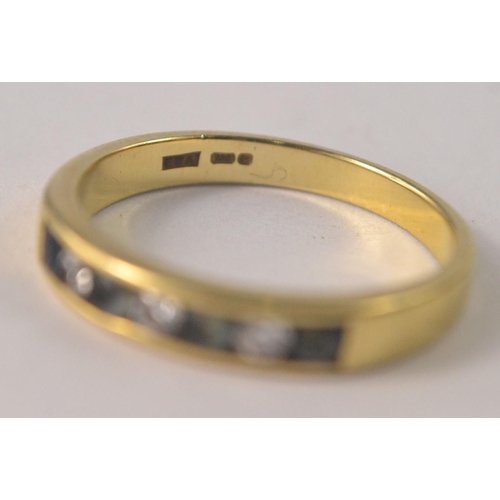 1 - A 750 stamped yellow gold half eternity ring, set with aqua marines and Three lovely diamonds custom... 