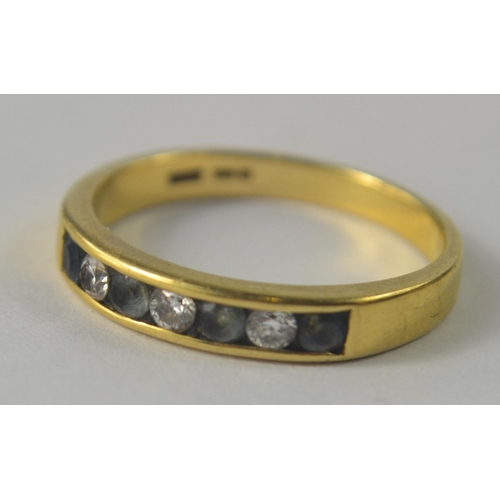 1 - A 750 stamped yellow gold half eternity ring, set with aqua marines and Three lovely diamonds custom... 