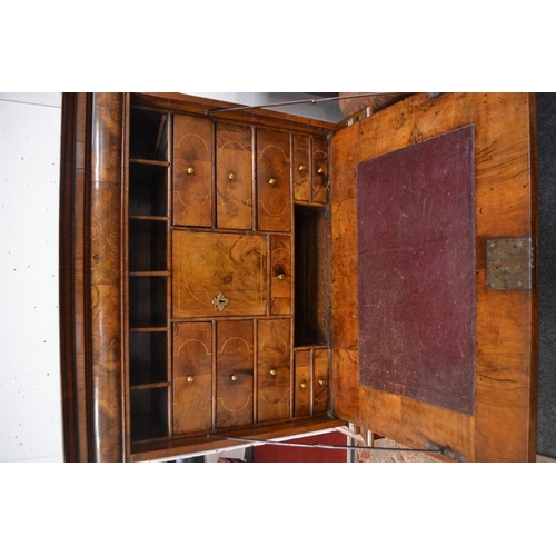 197 - Early 18th century escritoire made of very fine sections of quarter cut walnut veneer with cross ban... 