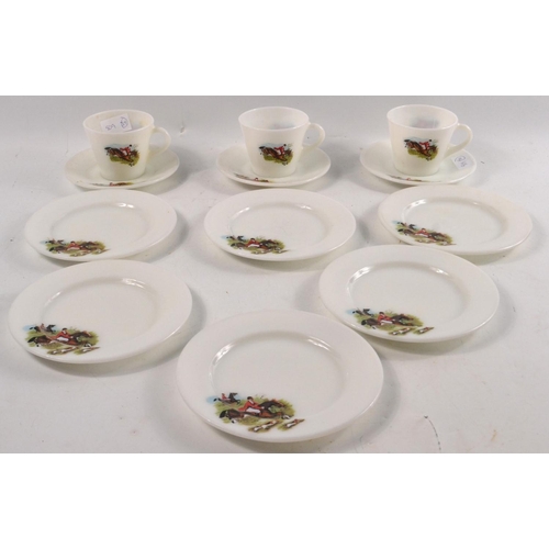 215 - A 3 cup MILK GLASS coffee or tea set with saucers (3)and side plates(6) with country fox hunting sce... 