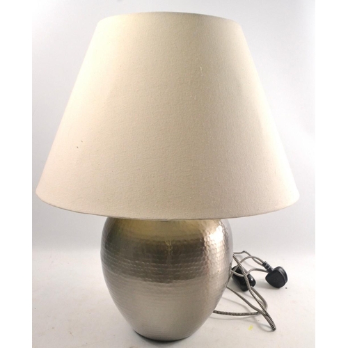 257 - A hammered effect stainless steel stylish table lamp with shade height with shade 56cm