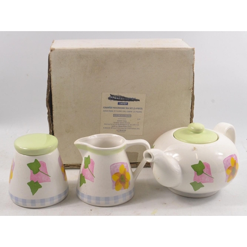 304 - A country patchwork branded new unused tea set 3 piece teapot sugar and cream jug - still boxed as n... 