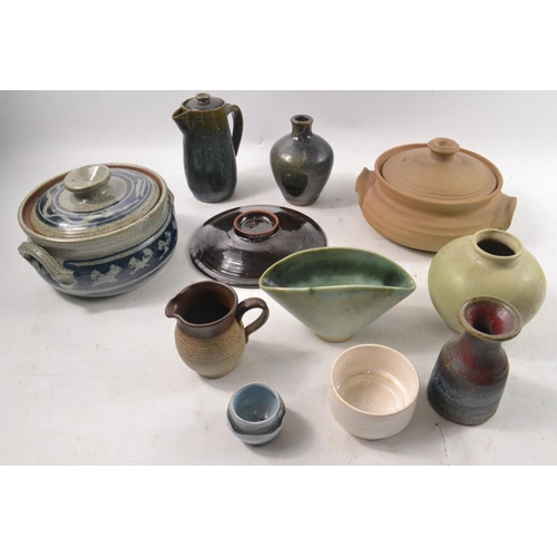 316 - Selection of studio pottery to include vases, plates etc