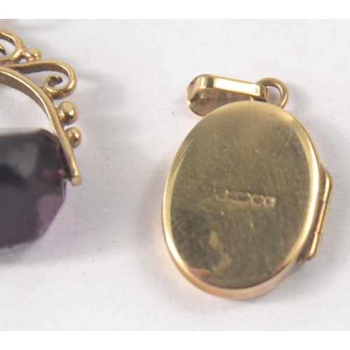 37 - Indistinct Hallmarked 375 yellow gold Locket 2.25g with also a Victorian 375 stamped fob charm With ... 