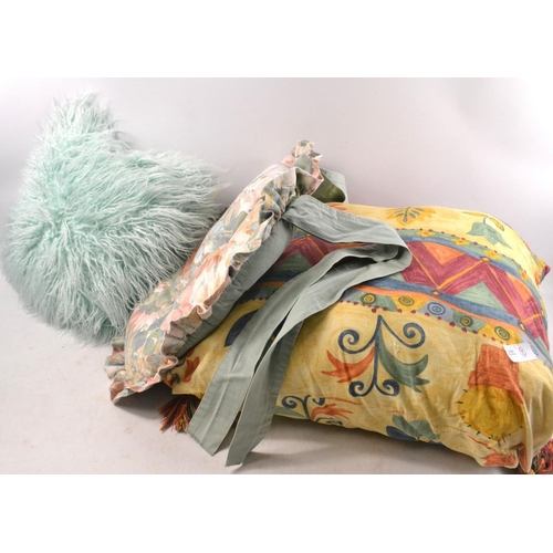 613 - An assortment of cushions.  (3)