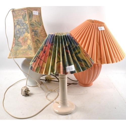 615 - Three ceramic based table lamps.  Largest lamp 53cm tall.