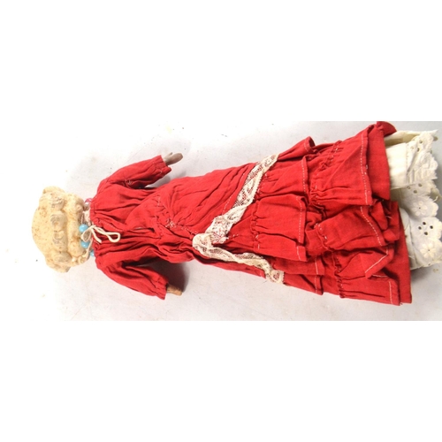 184 - A FRENCH vintage papermarche doll in red dress