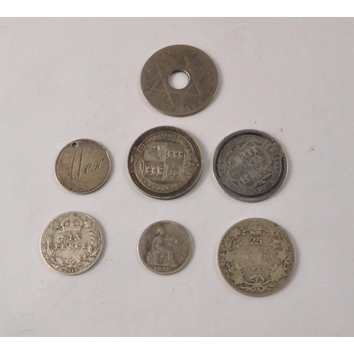 47 - A collection of silver coins to include a Victorian 1887 shilling, a British West African 1912 coin,... 