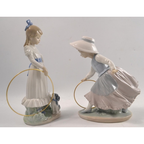 137 - 2 NAO figures to include a little girl with puppy and hoop and little girl in a bonnet with hoop