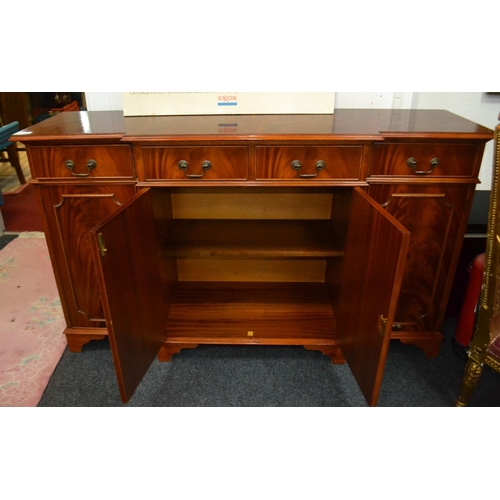 154 - OF THE HIGHEST QUALITY! A mahogany finish beautiful breakfront sideboard four drawer over three cupb... 