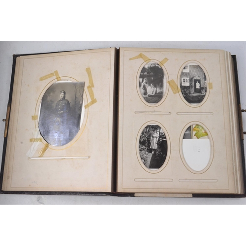 187 - A Nice Quality VICTORIAN family album with old family photographs (partially filled) 30cm x 23cm app... 