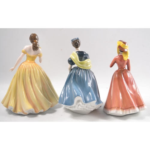 199 - 3 ROYAL DOULTON ladies to include 'Julia' HN 2705, 'Adrienne' H 2304 and Classics Figure of the year... 