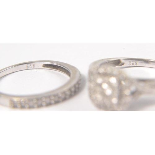 4 - A Bridal set of two rings in 9K stamped white gold with 0.455ct of diamonds inset in the engagement ... 