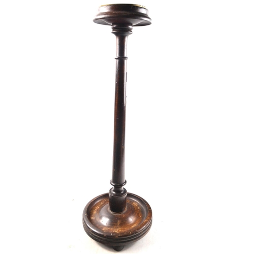 409 - A vintage cigarette stand in mahogany with brass tray top.