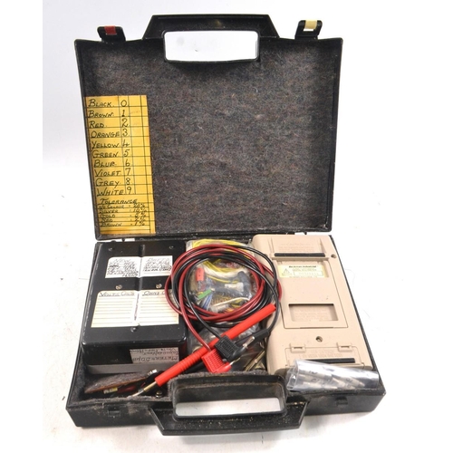 412 - A set of Multimeters and leads in a case to include the SALFORD Minitest multi-range test set and on... 