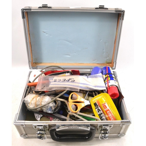 413 - Medium sized metal carry case containing crafts tools including screwdrivers, pliers, scissors, epox... 