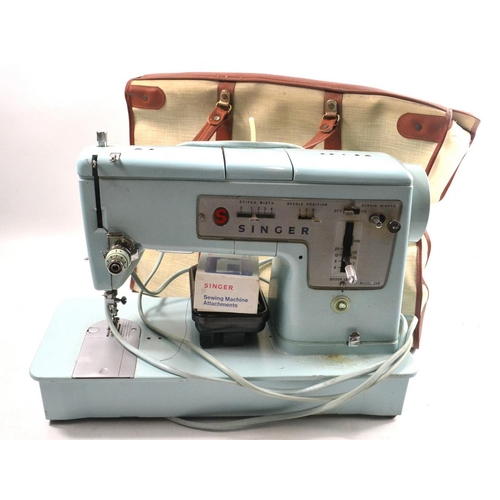 416A - Electric SINGER sewing machine with power cable and extras all within original SINGER carry bag