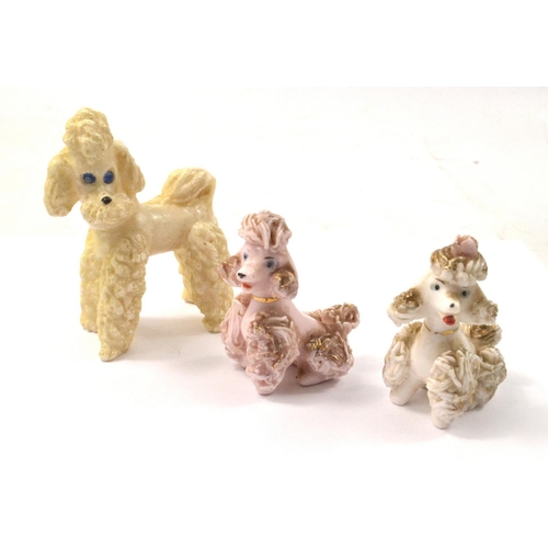 42 - A collection of three UNUSUAL poodle models tallest 8.5cm