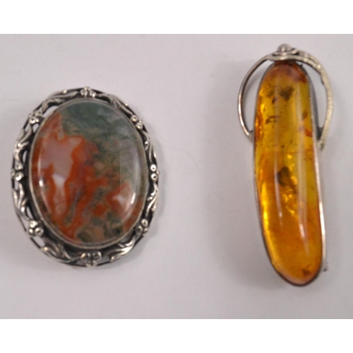 56 - A large piece of AMBER on a white metal(Hallmarked but indistinct hence 'white metal' bespoke brooch... 