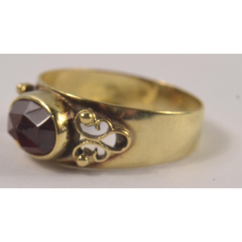 11 - GARNET DRESS ring stamped 585 14ct gold with one oval rose cut stone measuring 8mm x 6mm gross weigh... 