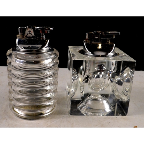 148 - A COLE & MASON glass table lighter 10cm with a RARE Japanese moulded glass table lighter 7cm base cu... 