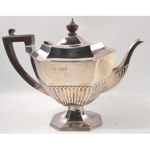 159 - Three piece Half fluted style silver tea service by ROBERT PRINGLE & Sons 1895 to include a teapot s... 