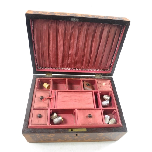 174 - A antique marquetry inlaid rosewood box with pink satin interior