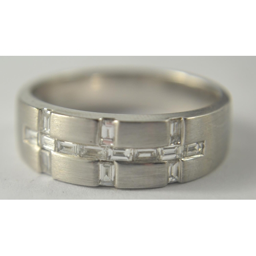 37 - A nice quality BLING 750 stamped white gold band with a total of 0.78 carats in baguette cut diamond... 