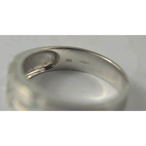 37 - A nice quality BLING 750 stamped white gold band with a total of 0.78 carats in baguette cut diamond... 