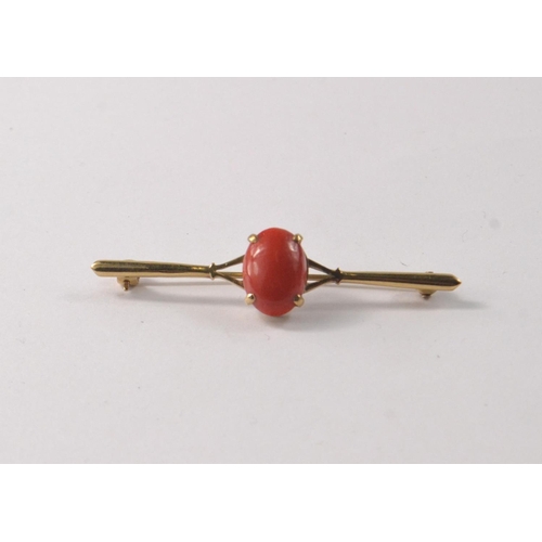 45 - CORAL BROOCH pinkish orange cabouchon stone, Hallmarked 9ct gold Birmingham 1973