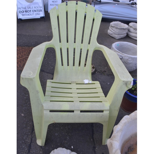 492 - A lime green resin garden relaxing chair