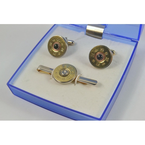 76C - UNUSUAL!  Matching set of cufflinks and tie pin made from Gamebore shells, cufflinks set with bloods... 