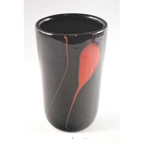 122 - TOP QUALITY! AN ART GLASS vase with black background and orange design