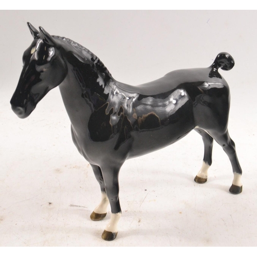 59 - BEAUTIFUL BESWICK pottery black stallion, stamped at base