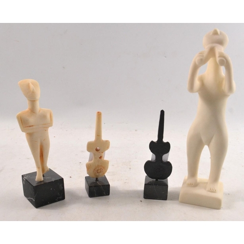 54 - UNUSUAL!  ASIAN Two small statues    ( think from stone composite) Taller height 21cm with two even ... 