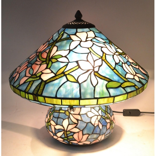 90 - UNUSUAL TIFFANY inspired table lamp with blue background and lilac floral decoration(Diameter taken ... 